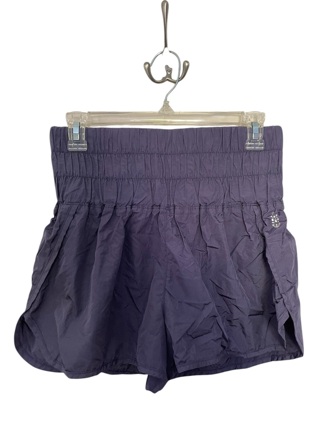 Purple Free People athletic shorts.