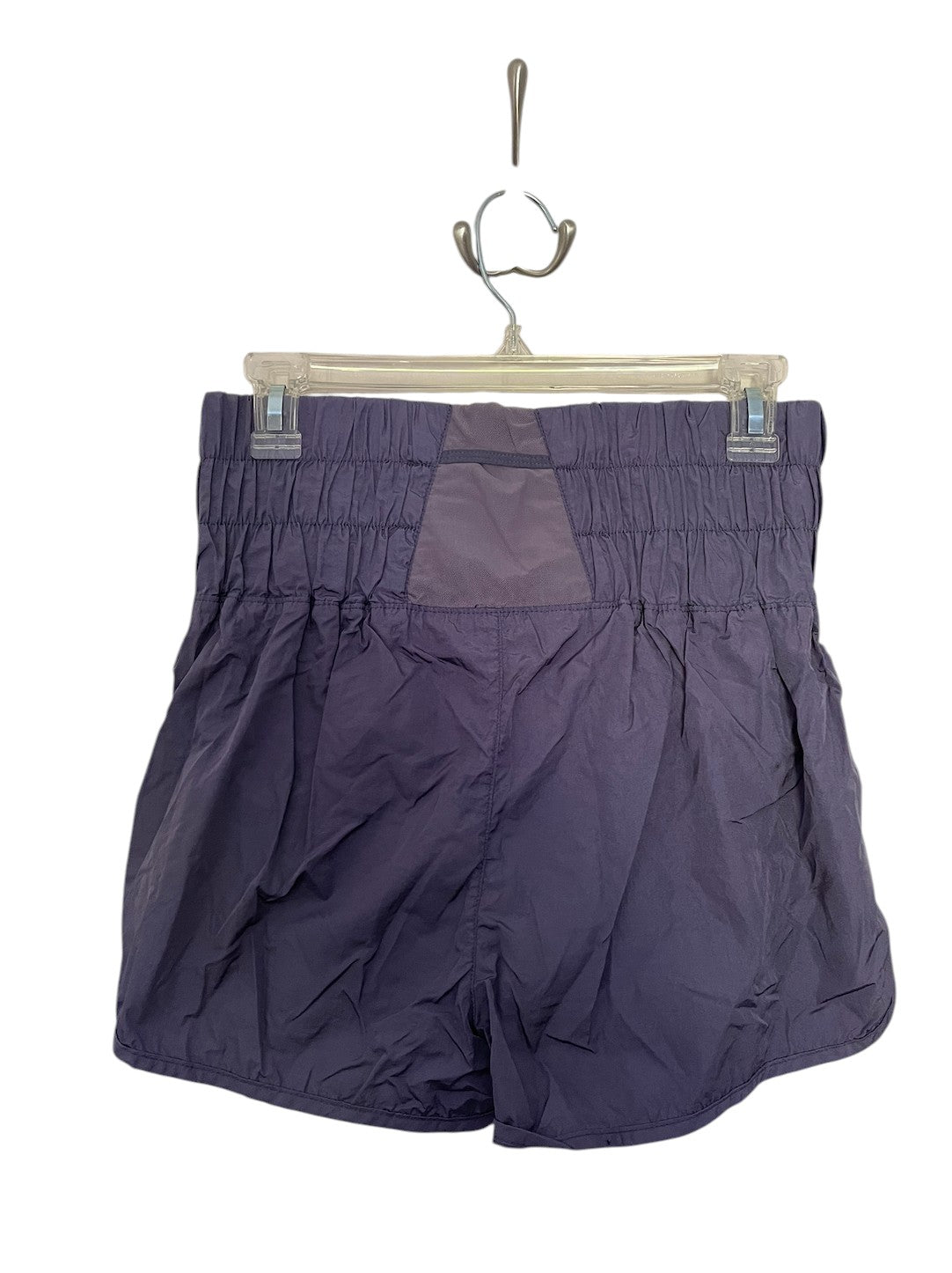 Purple Free People athletic shorts.
