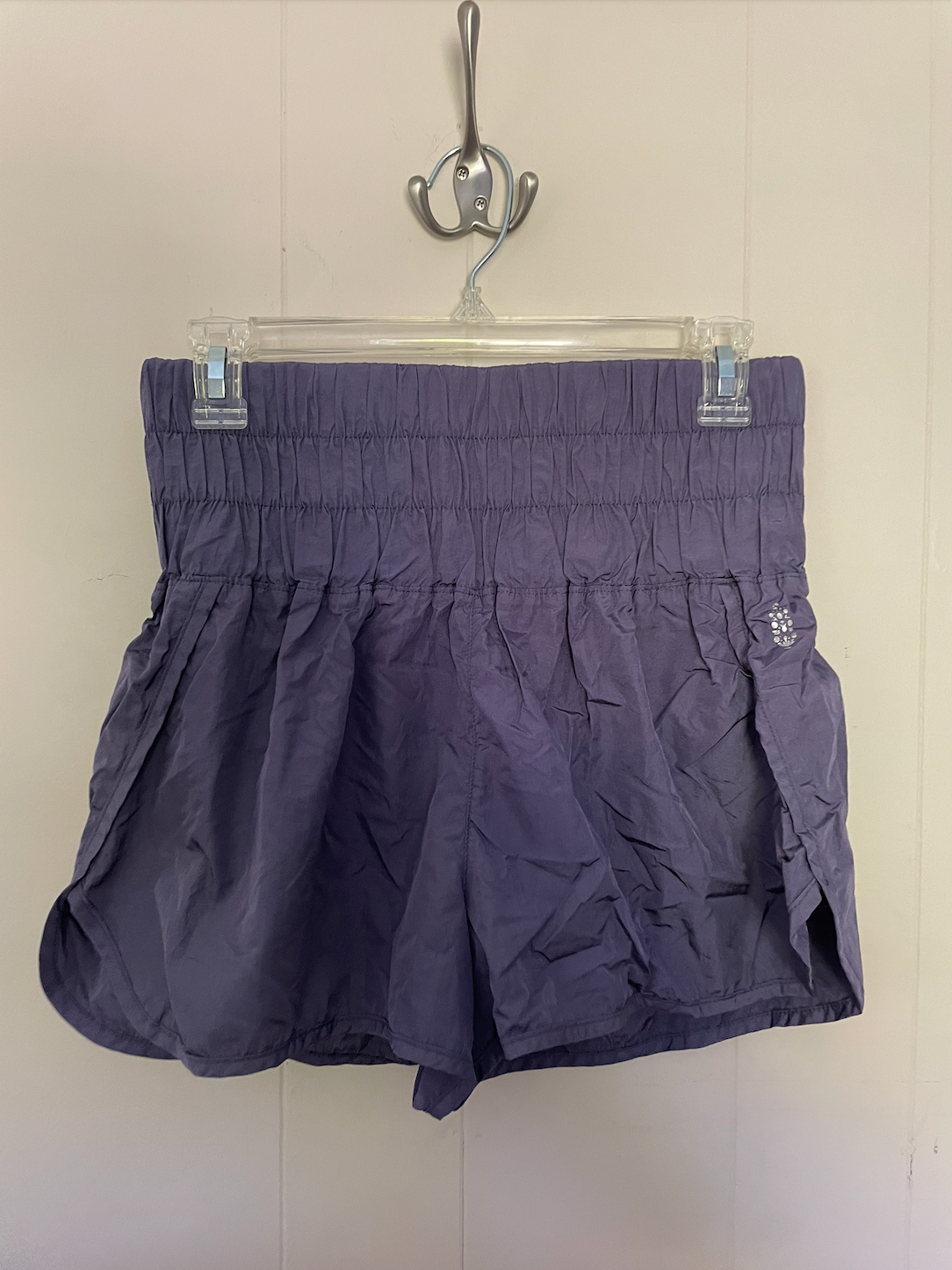 Purple Free People athletic shorts.