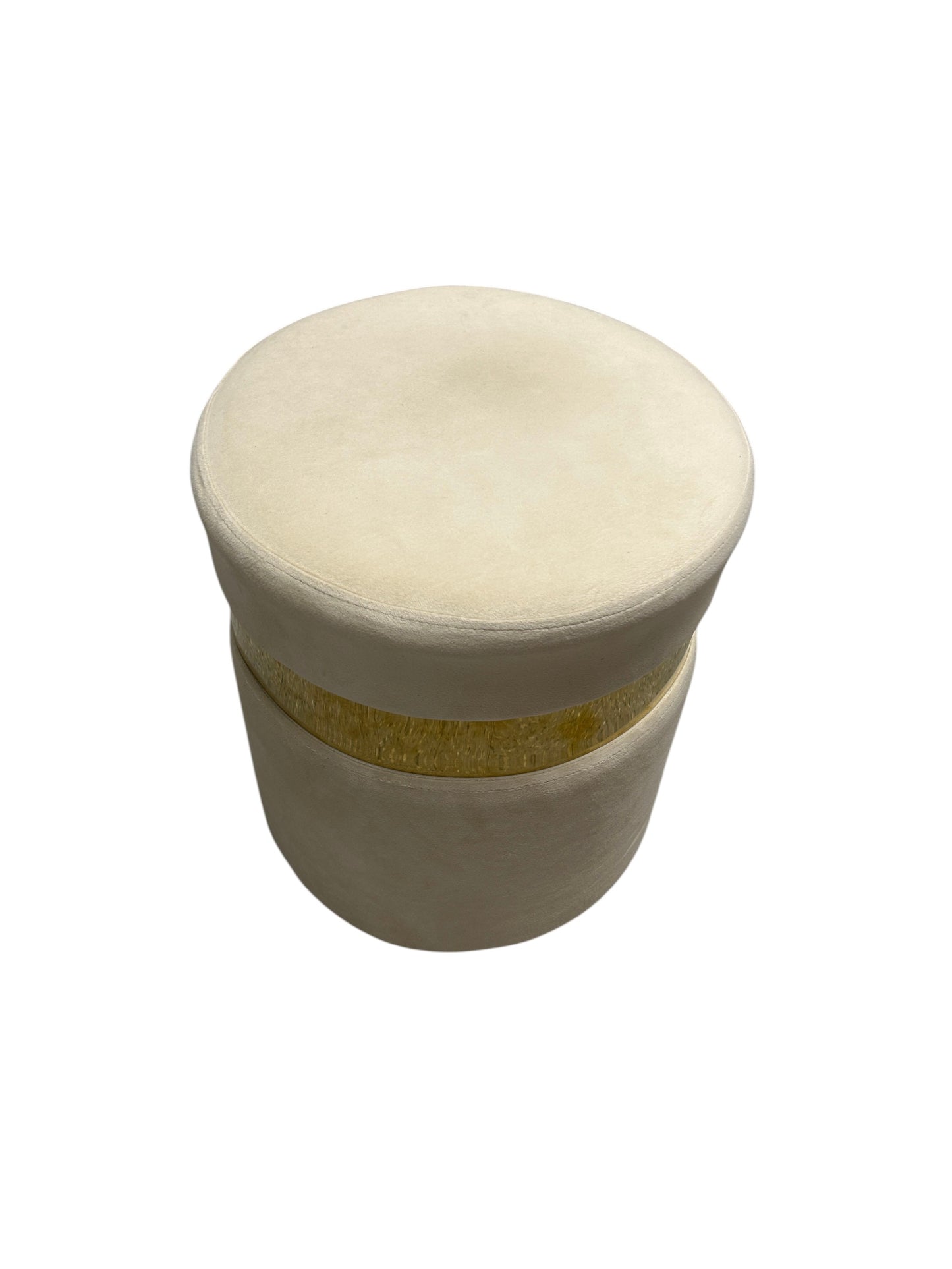 Cream velvet ottoman with a gold accent band.