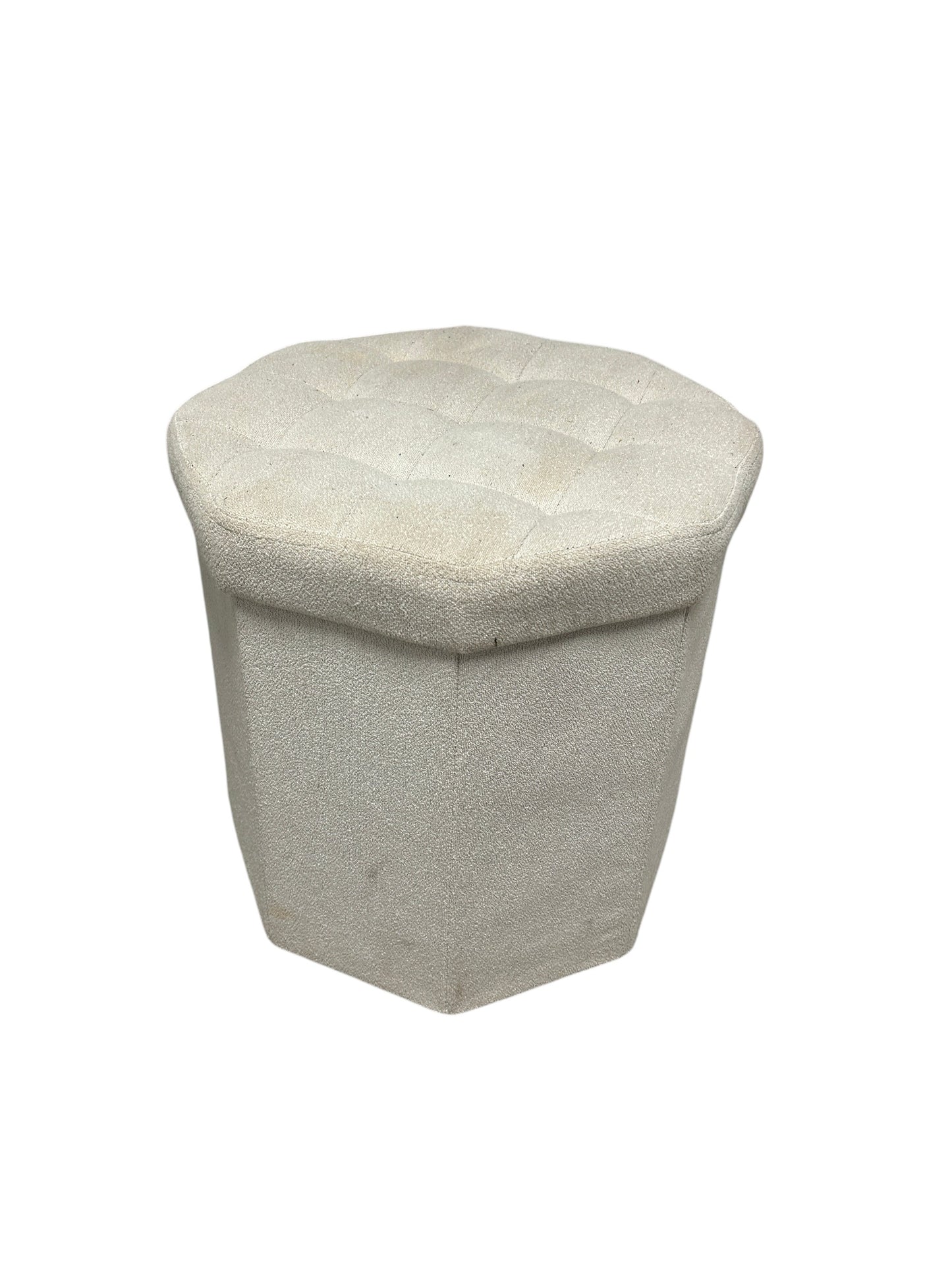 Light gray upholstered ottoman with storage.