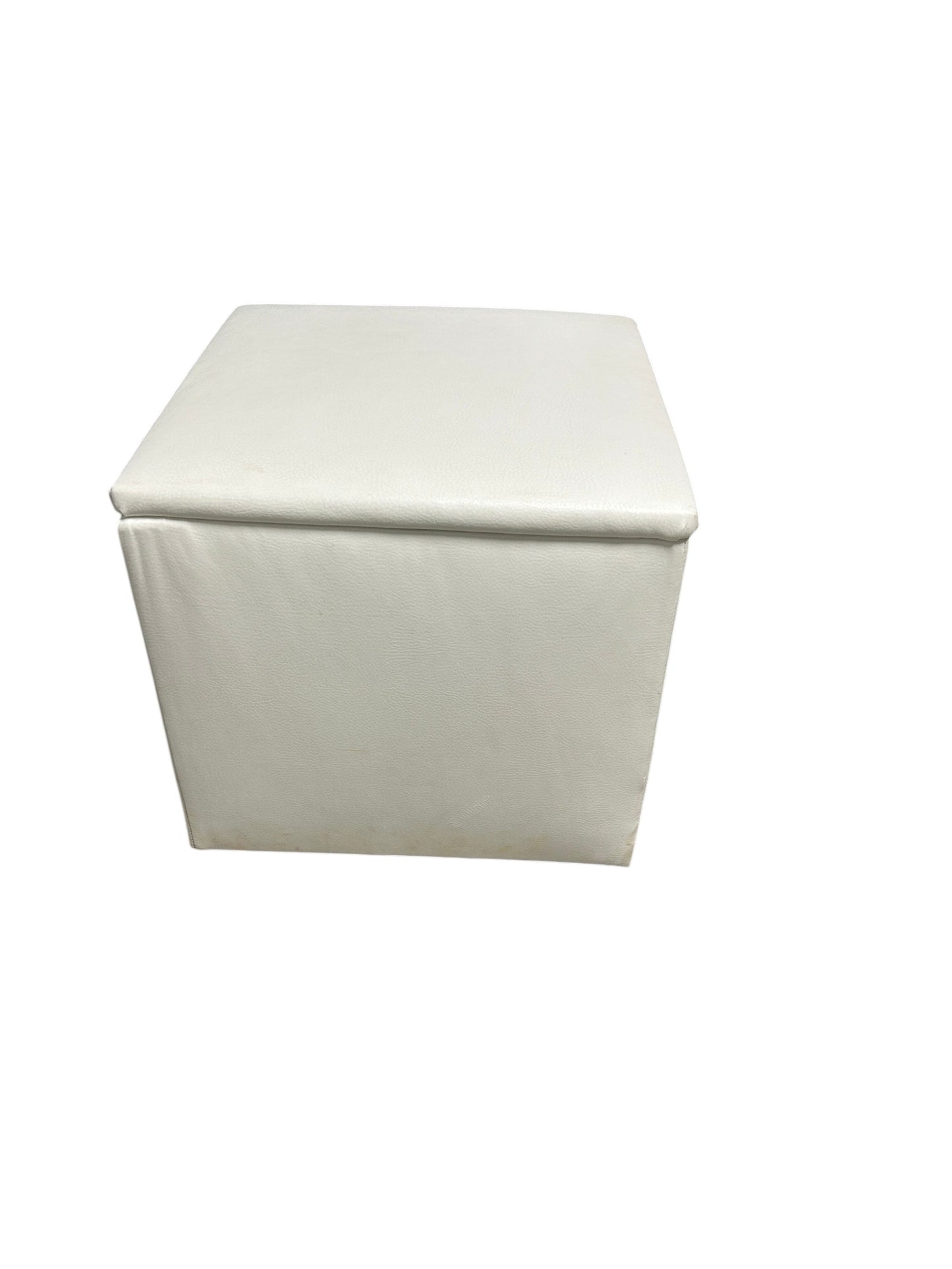 White faux leather square storage ottoman.