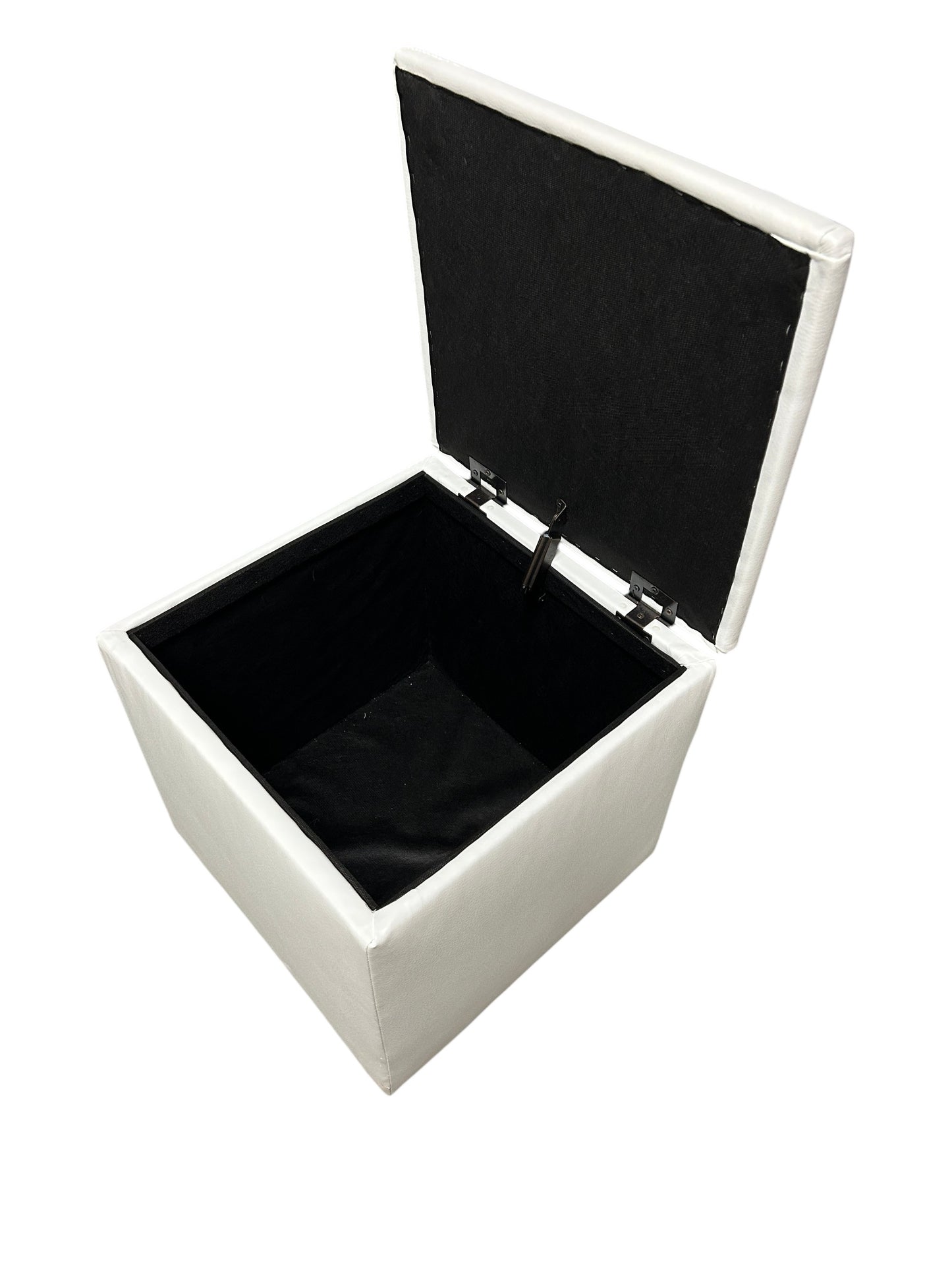 White faux leather square storage ottoman.