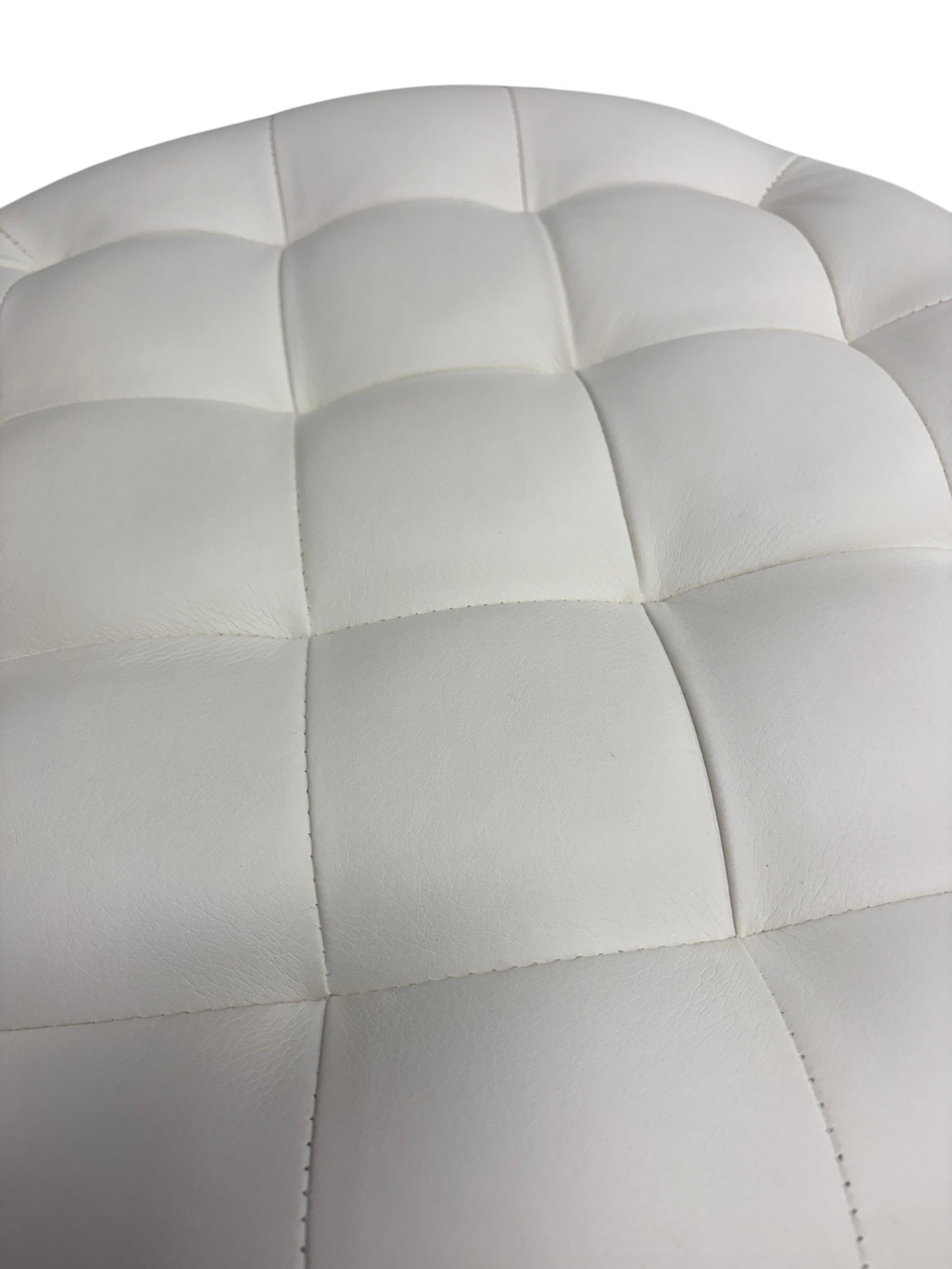 White round ottoman with storage.