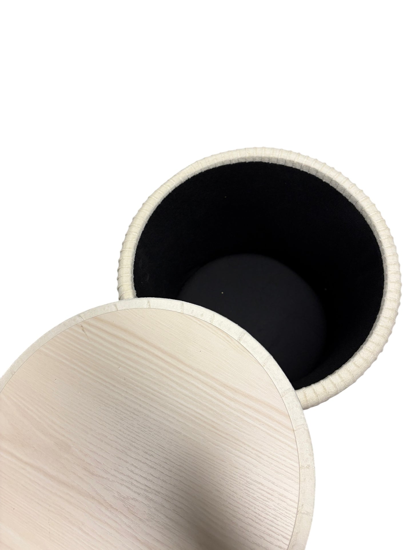 Cream velvet ottoman with storage.