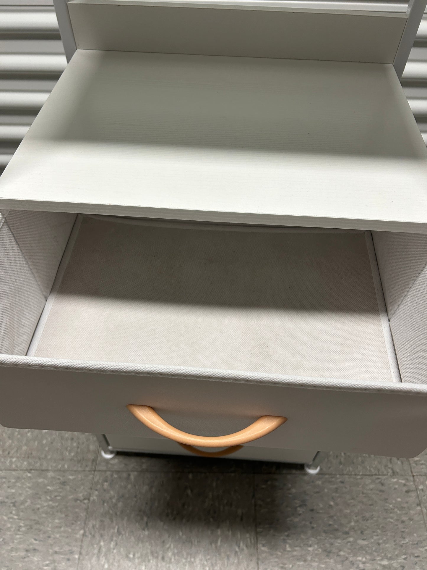 White nightstand with 4 drawers.