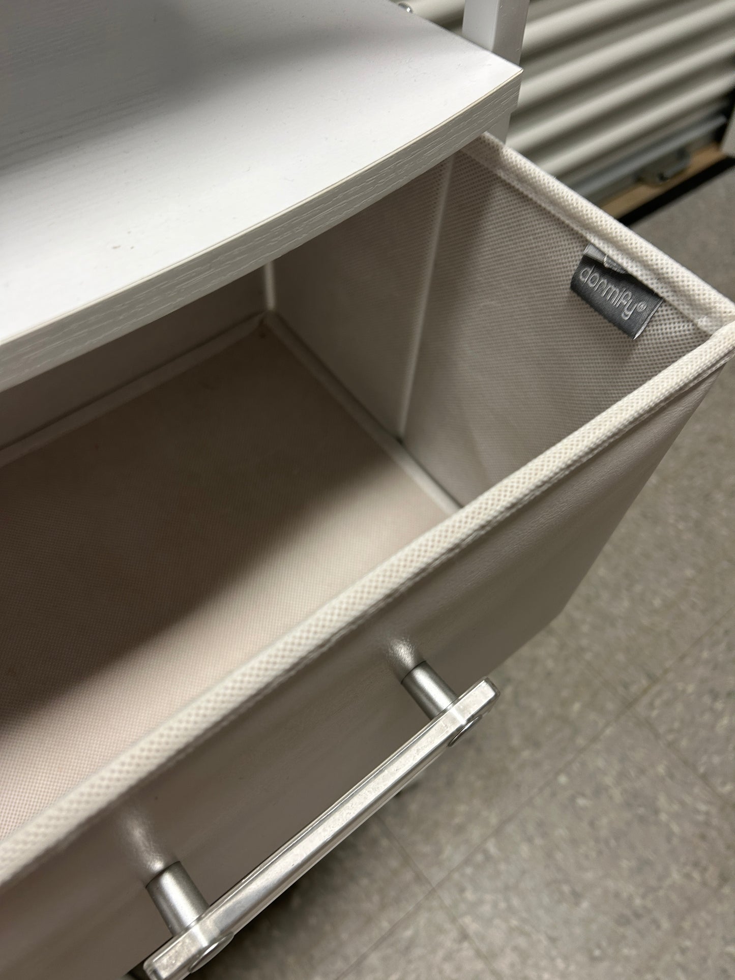 Dormify white nightstand with 3 drawers and power outlets.
