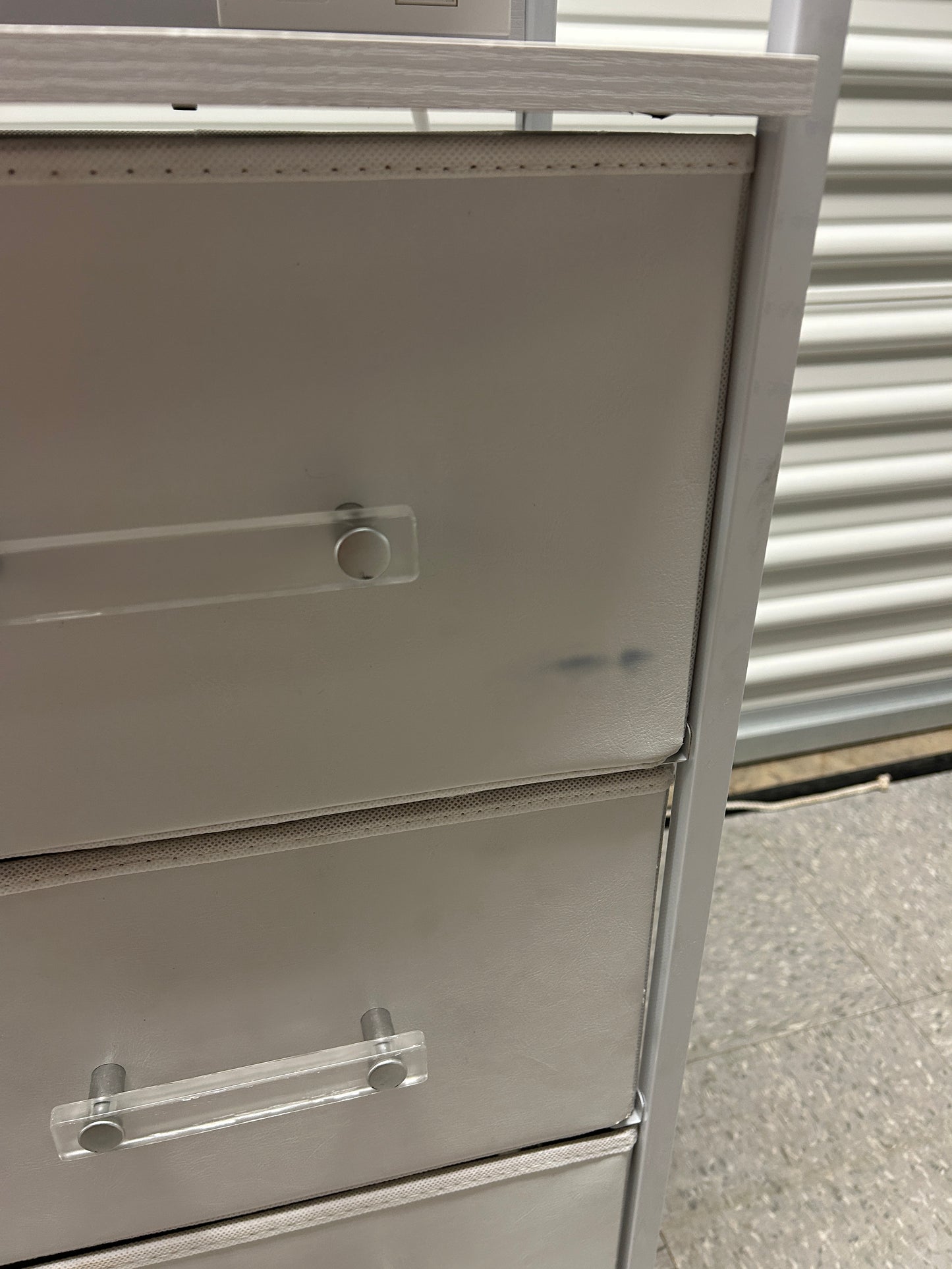 Dormify white nightstand with 3 drawers and power outlets.