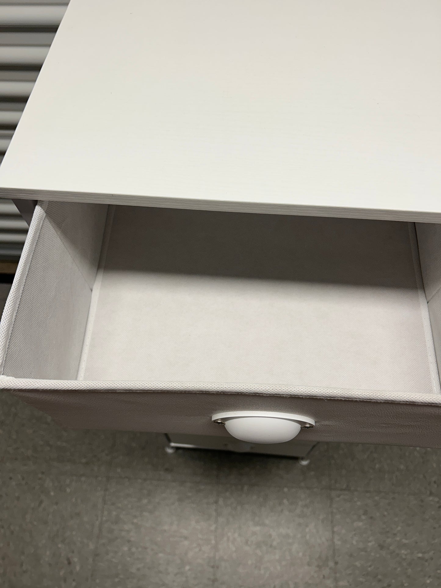 White nightstand with 6 drawers.