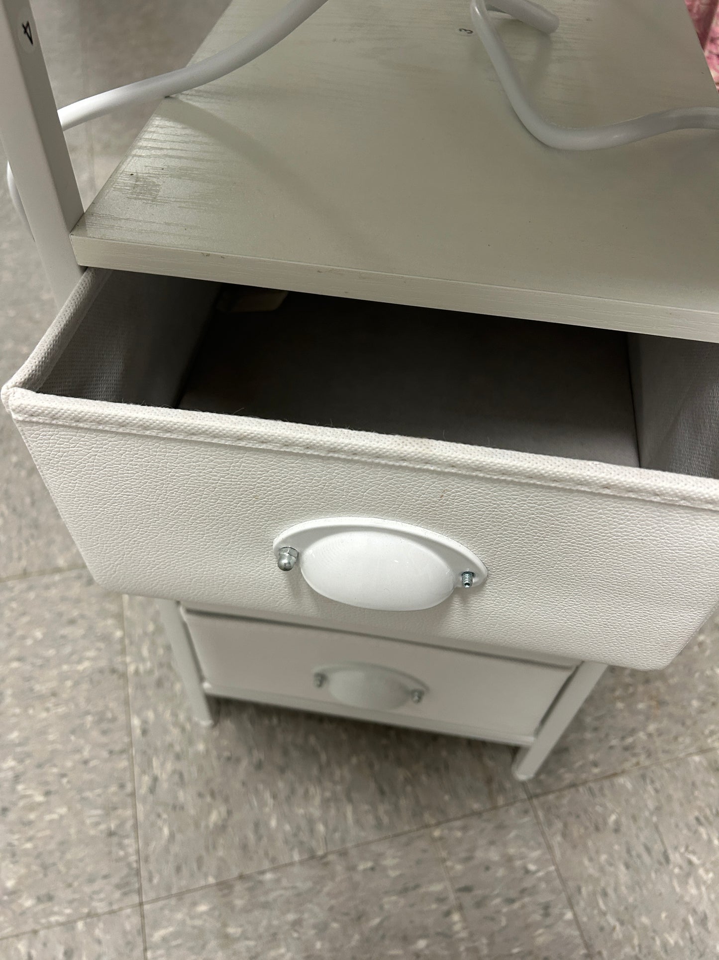 Wayfair white side table with 3 drawers and power outlets.