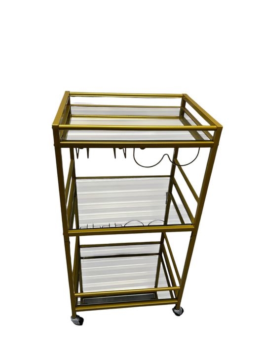 Gold bar cart with 3 glass shelves.