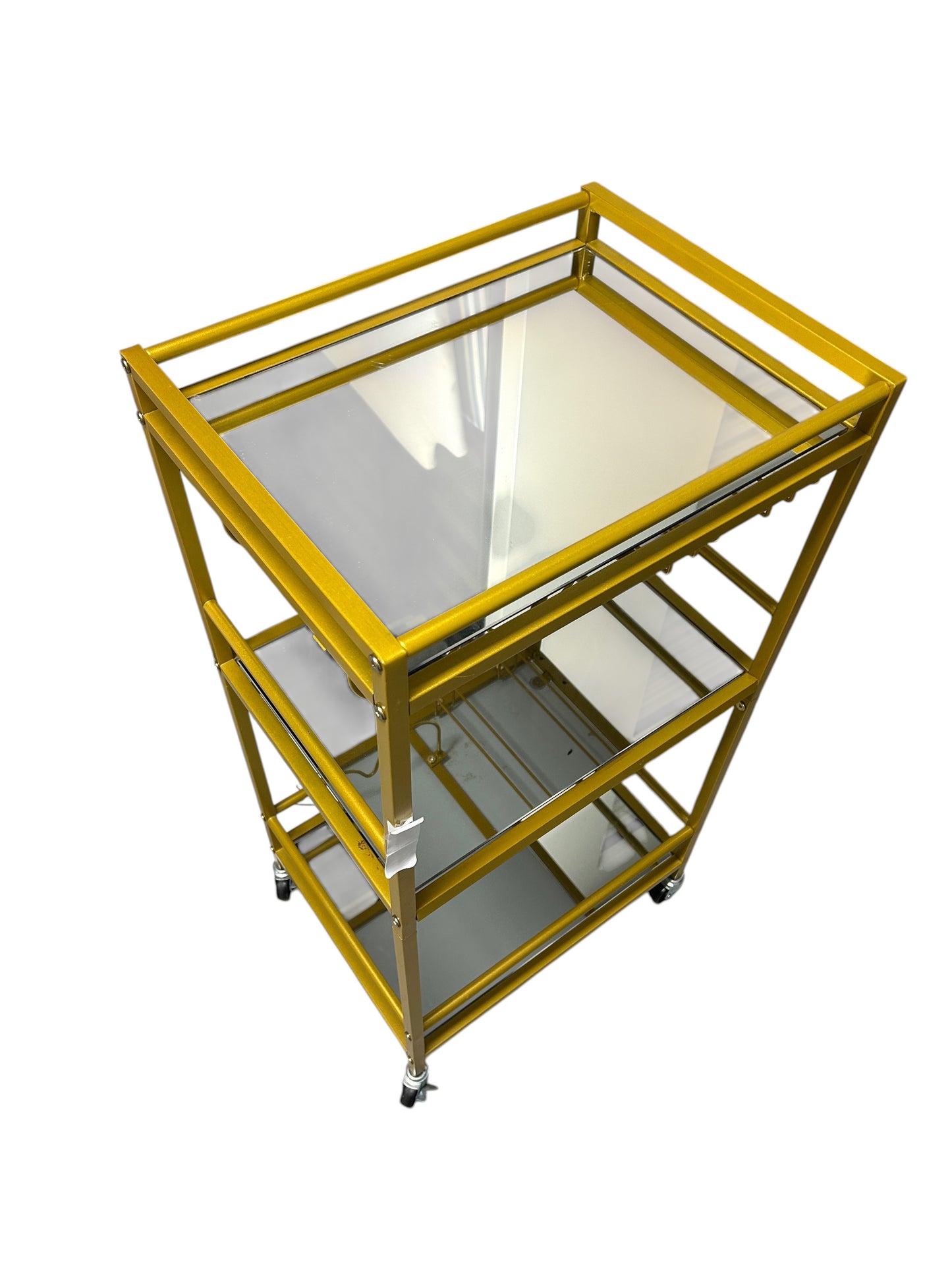 Gold bar cart with 3 glass shelves.