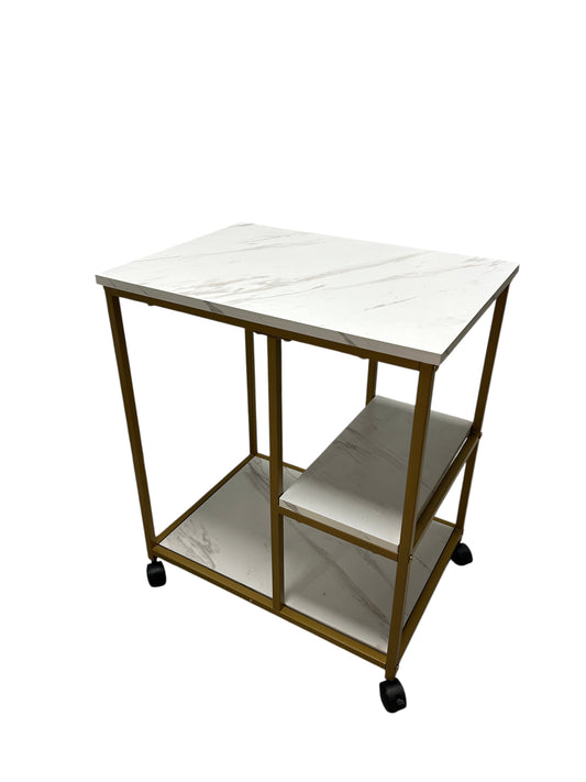 Gold bar cart with marble-like shelves.
