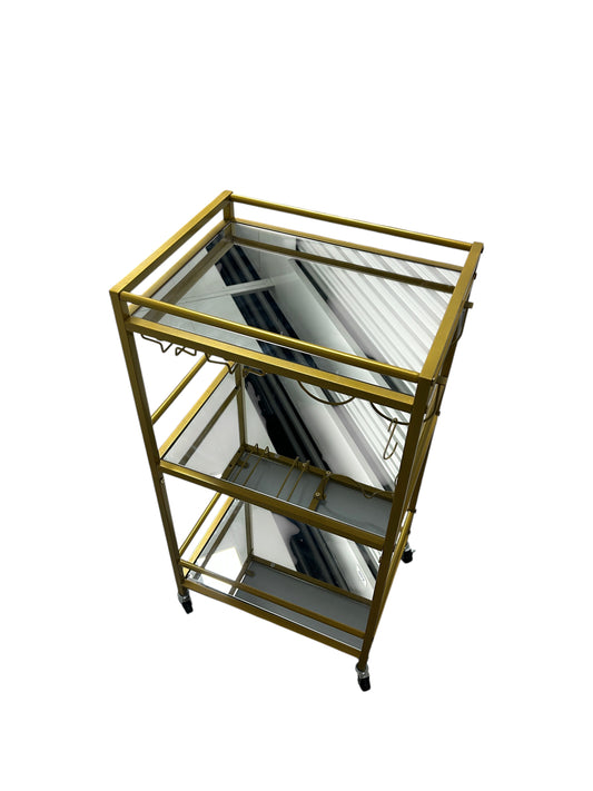 Gold bar cart with 3 glass shelves.