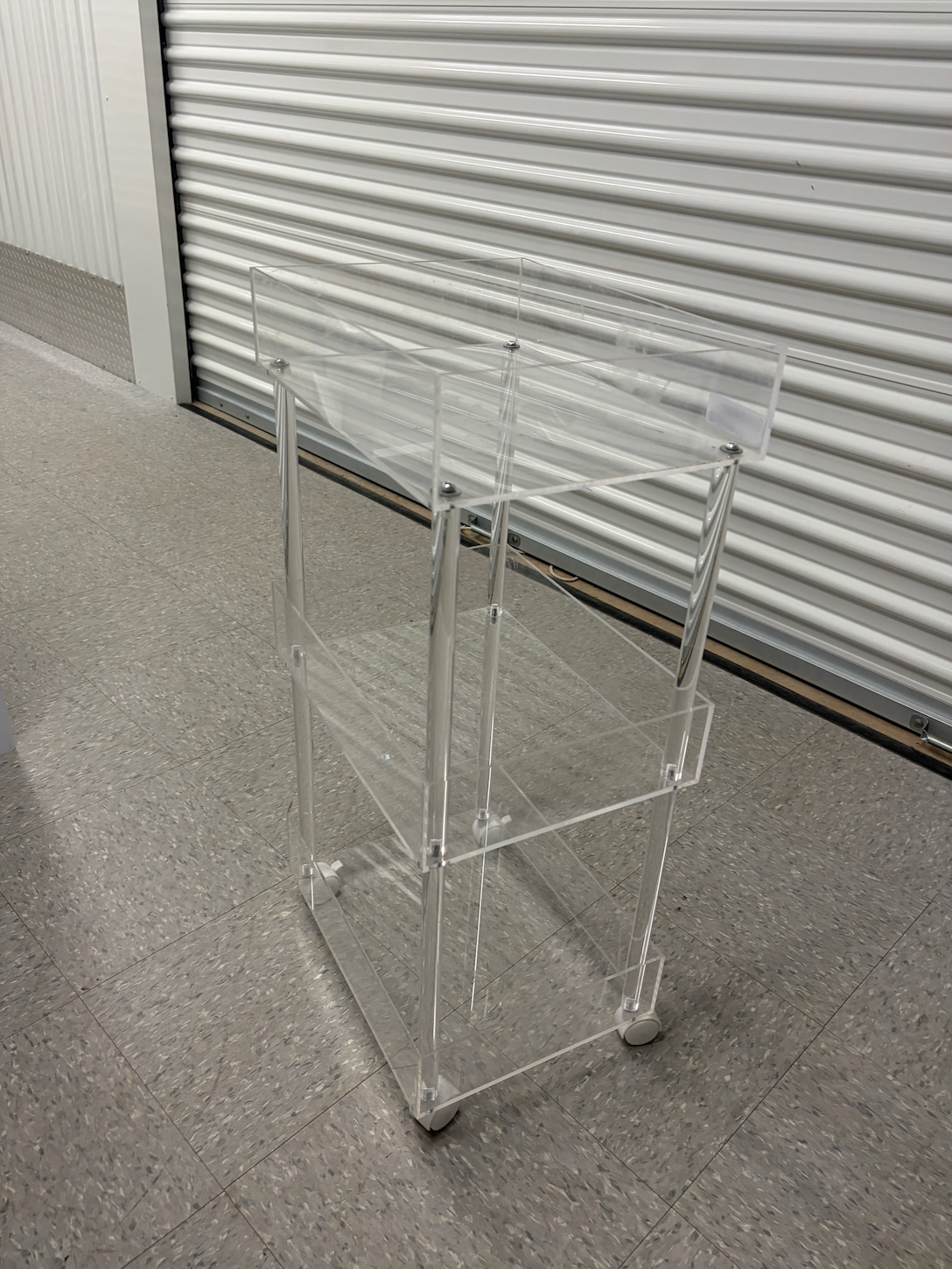 The Container Store clear 3 tier rolling cart.