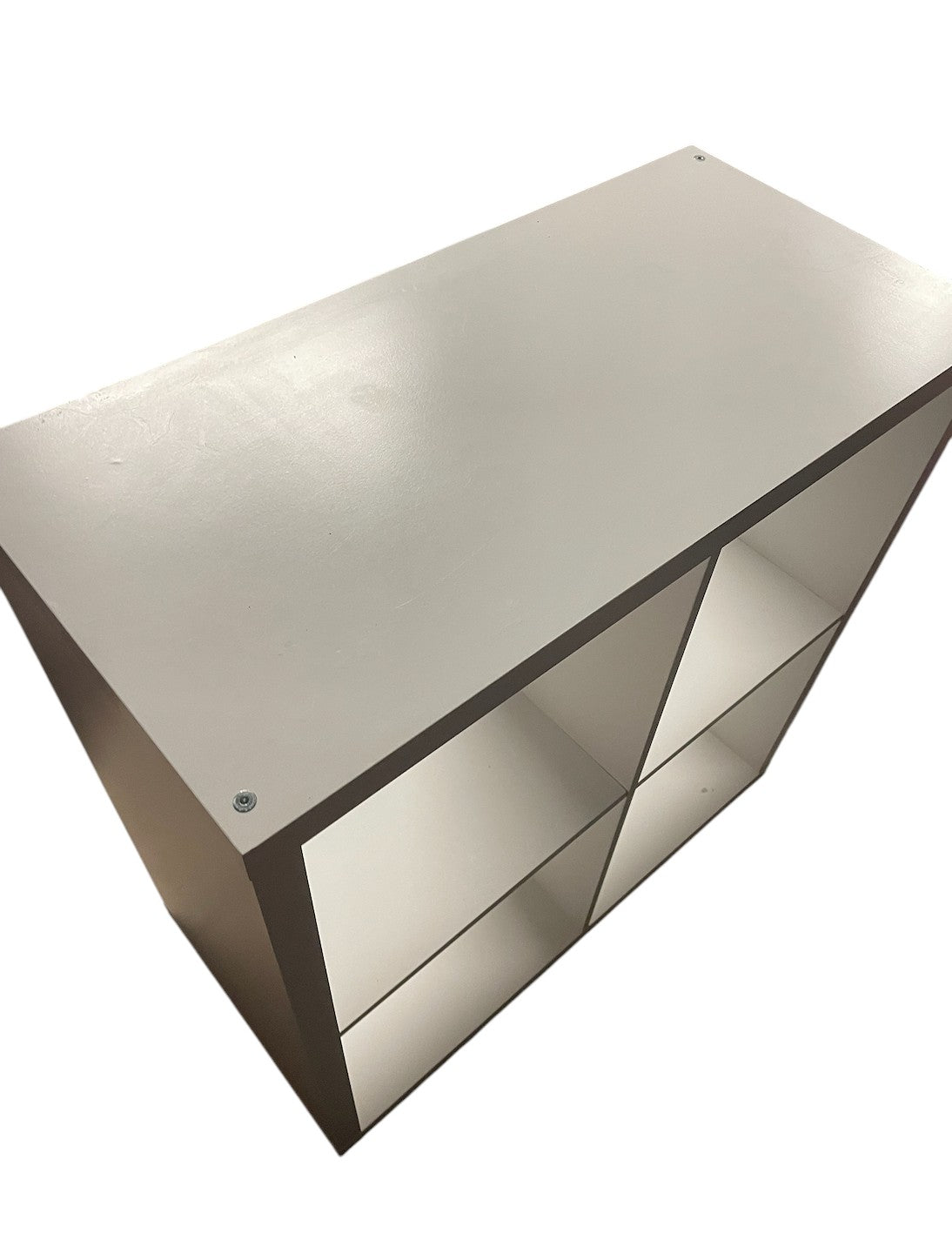 IKEA white storage shelving unit.