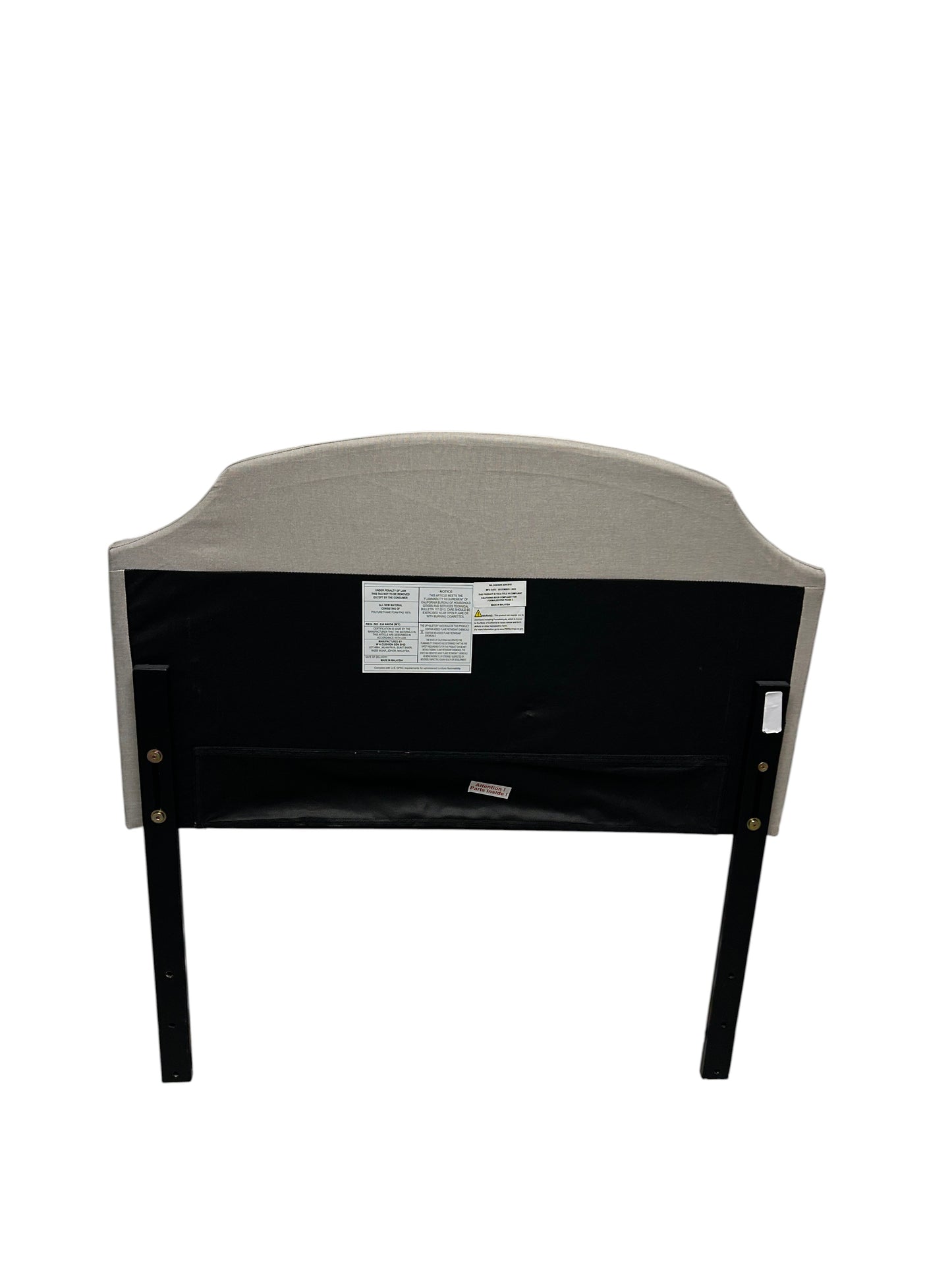 Gray twin headboard with silver buttons and black legs.