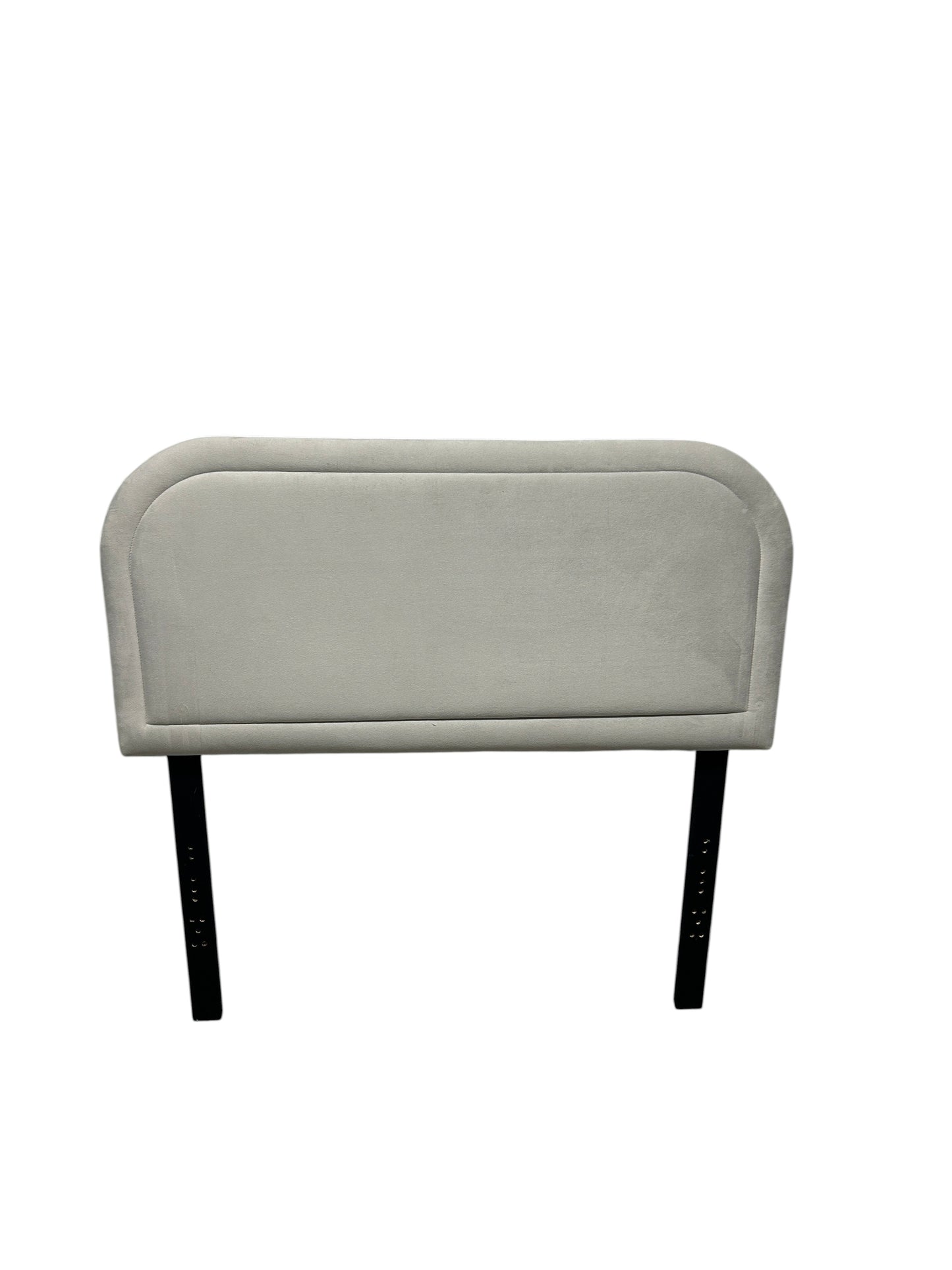 Gray twin velvet headboard with black legs.