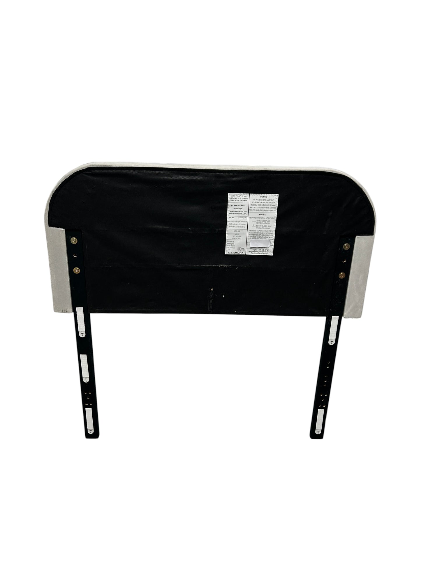 Gray twin velvet headboard with black legs.