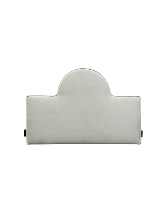 White velvet twin headboard with black legs.