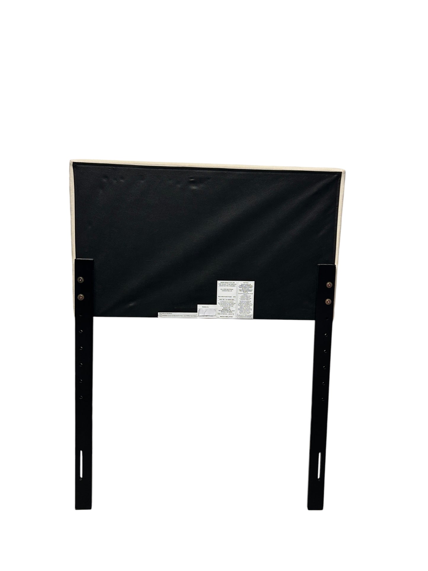 Cream twin headboard with black legs.