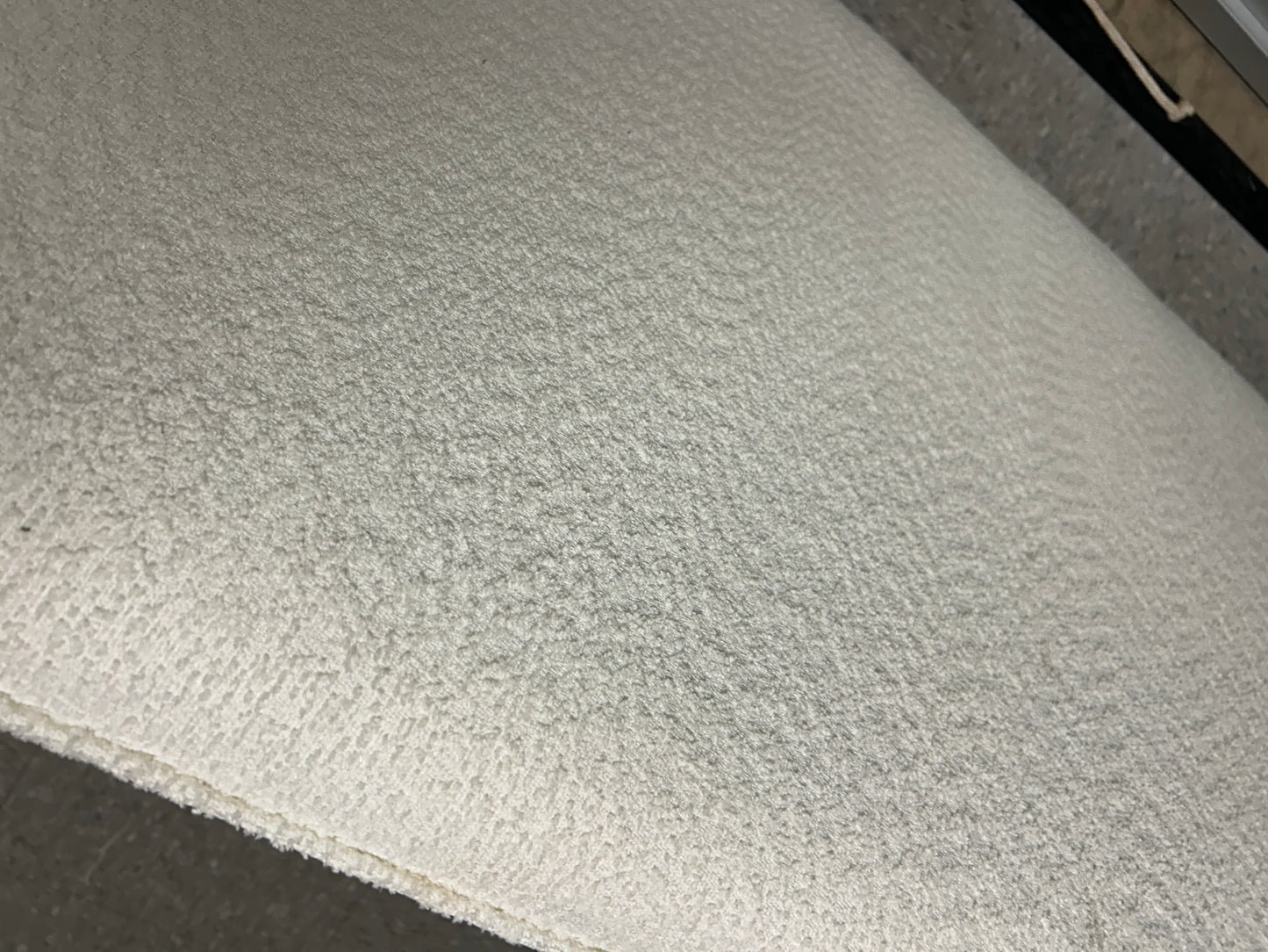 White yarn queen headboard with removable legs and parts.