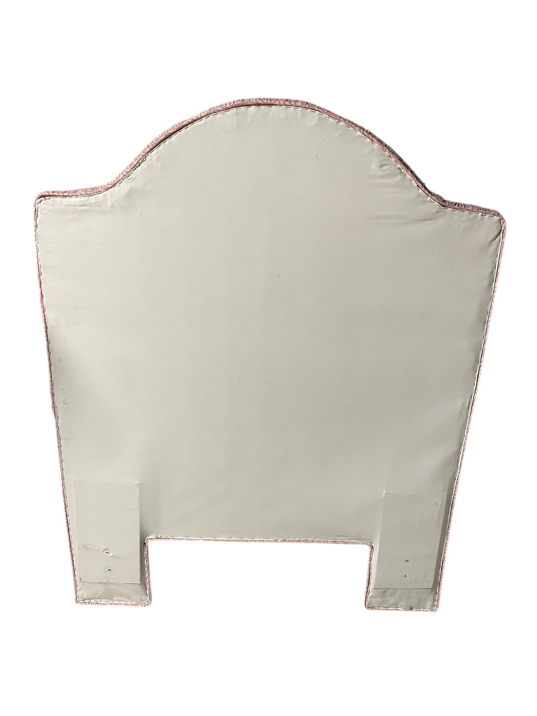 Custom-built pink and white patterned twin headboard.