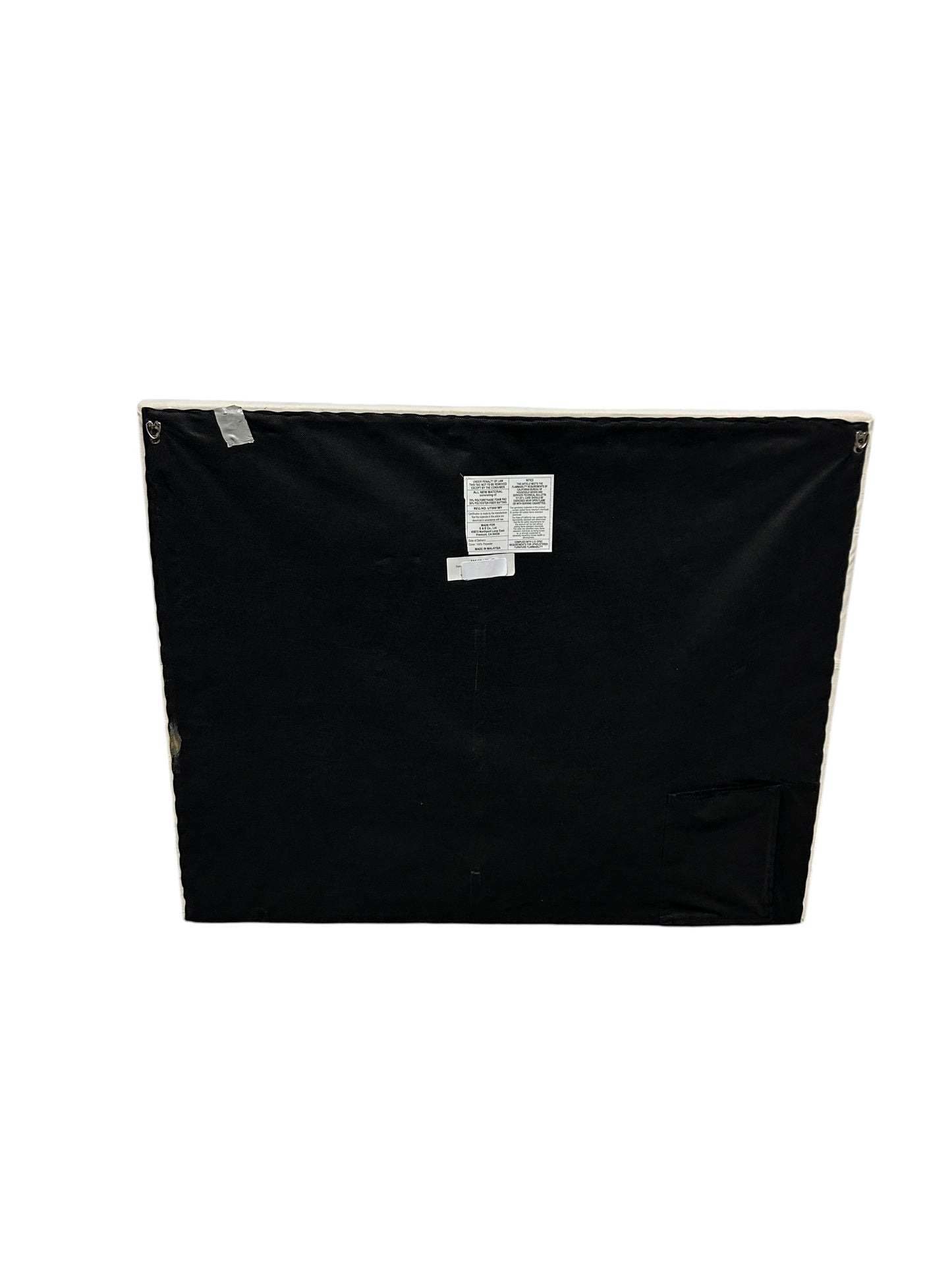 Cream velvet twin headboard with charging port.