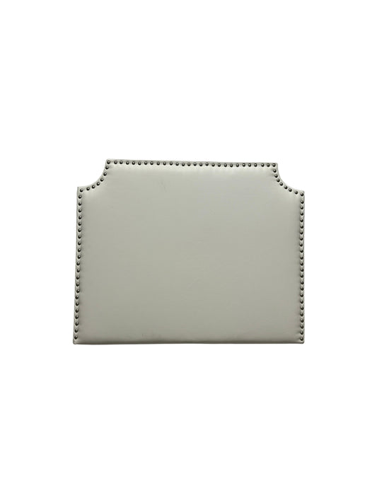 Dormify white twin headboard with silver buttons and a charging outlet.