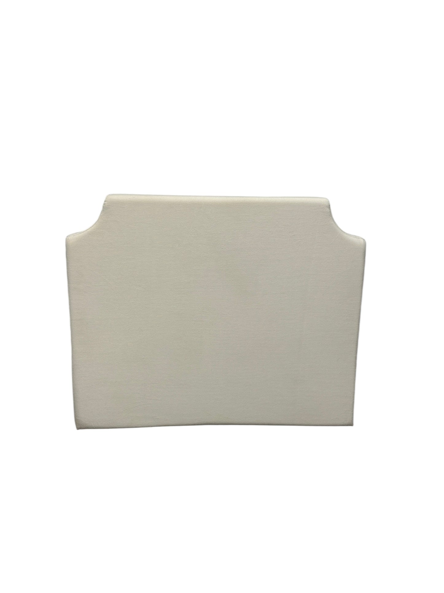 Cream velvet twin headboard with curved notched corners.