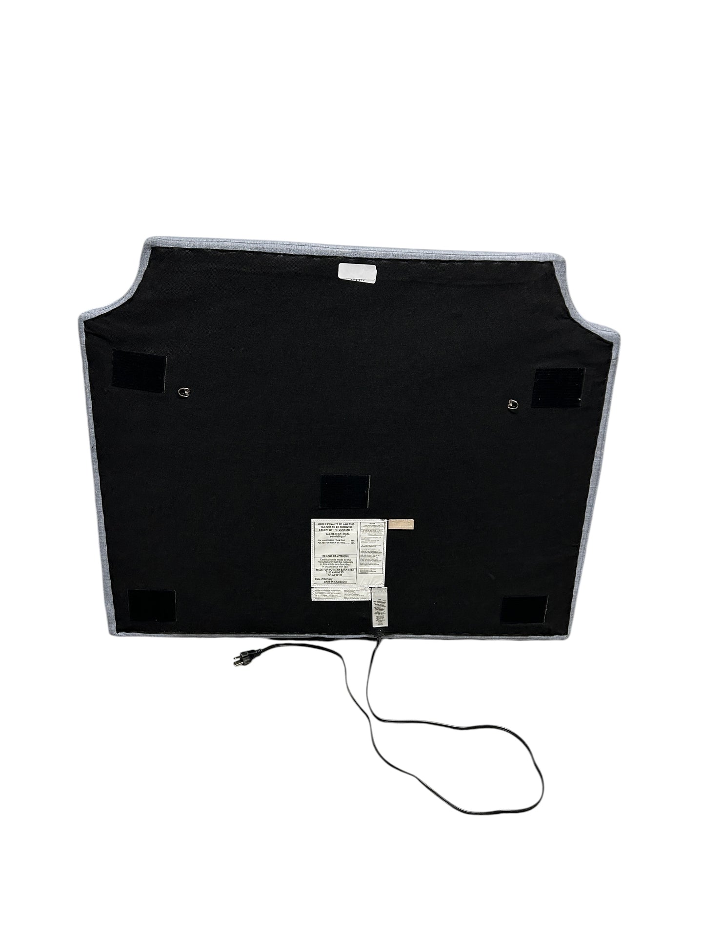 Pottery Barn Teen blue twin headboard with white piping and charging port.