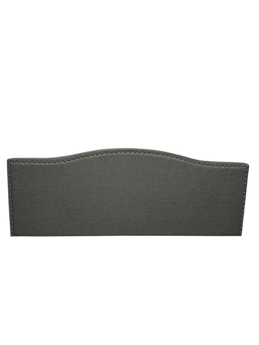 Gray queen headboard with silver buttons and attachable legs.