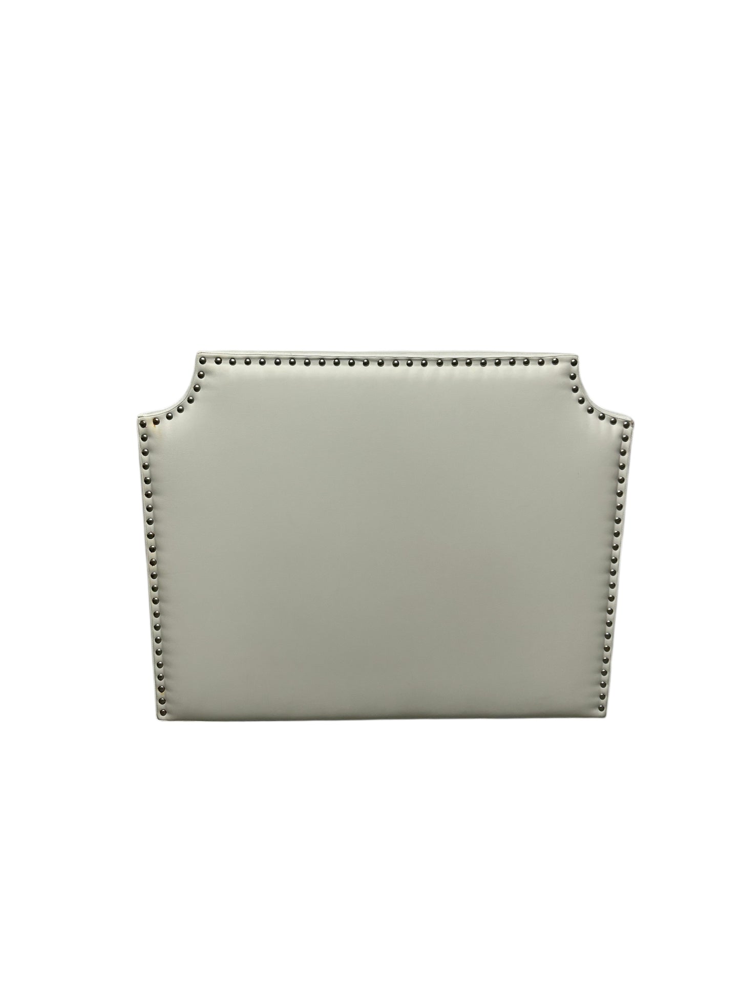 White twin headboard with silver buttons and a charging outlet.