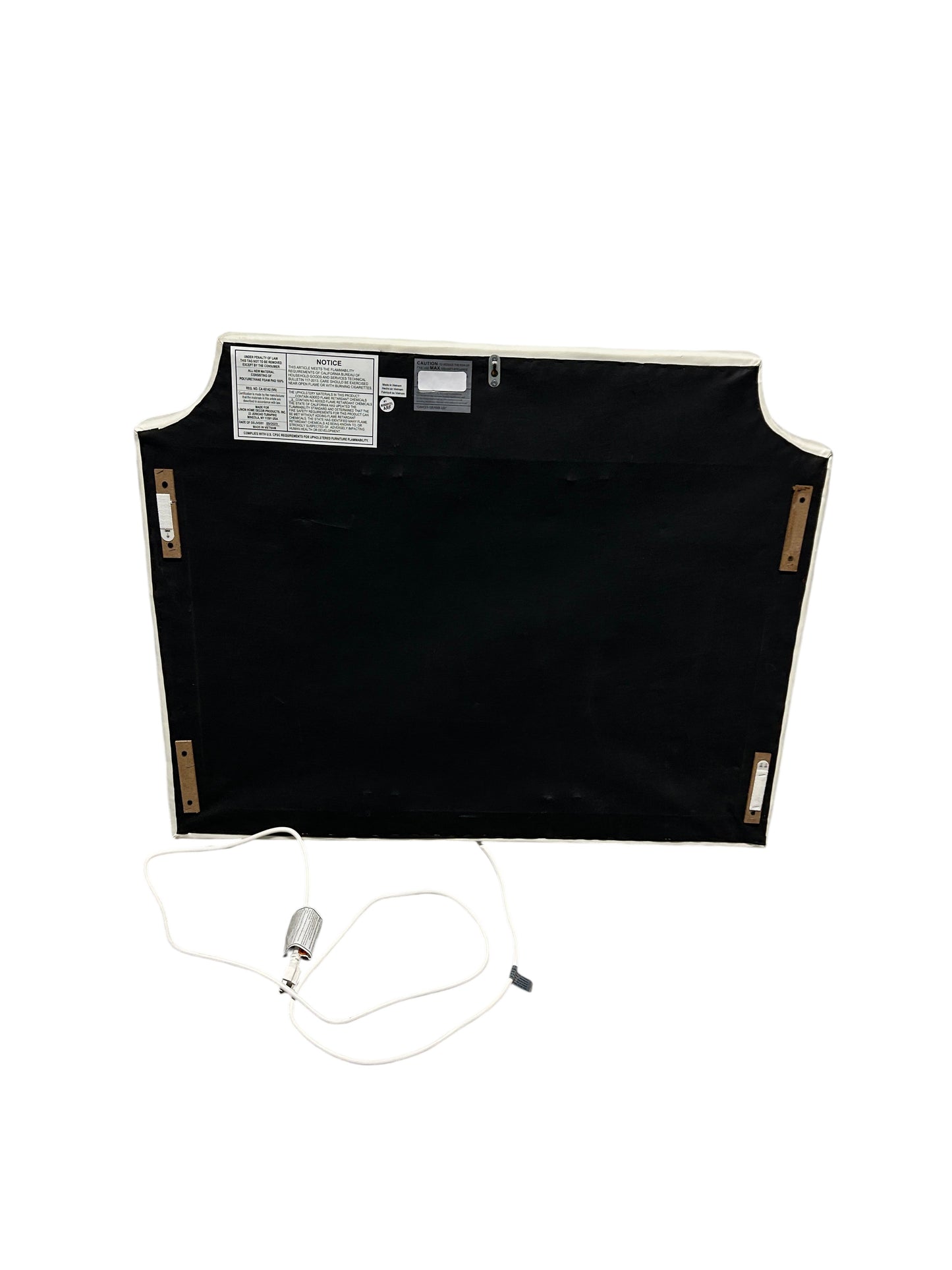 White twin headboard with silver buttons and a charging outlet.