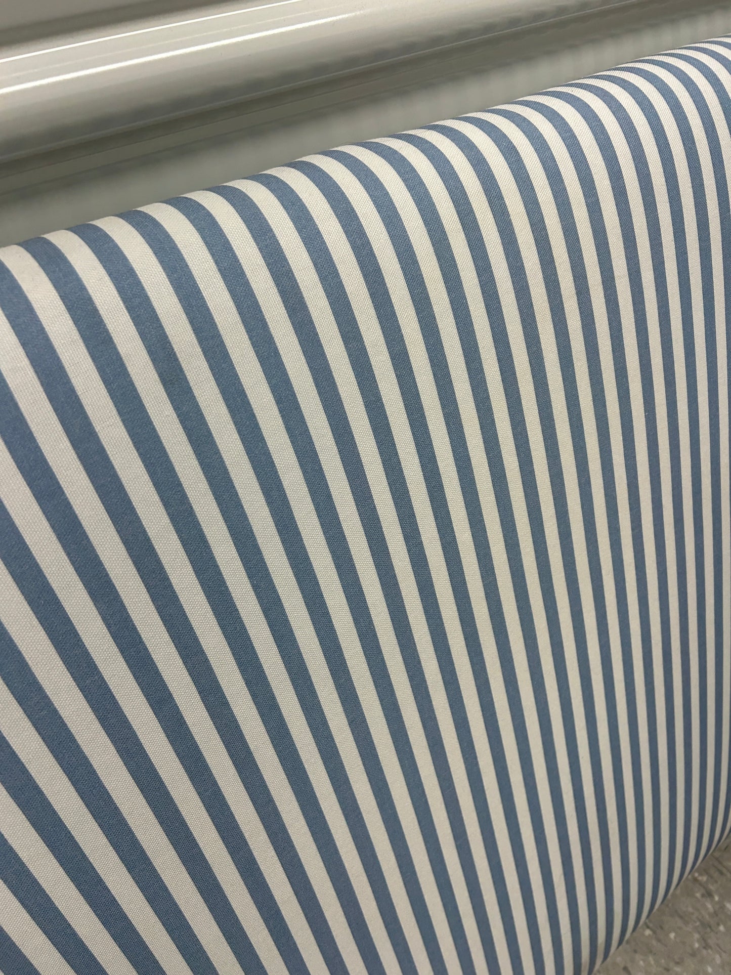 Blue and white striped twin headboard with attachable legs.