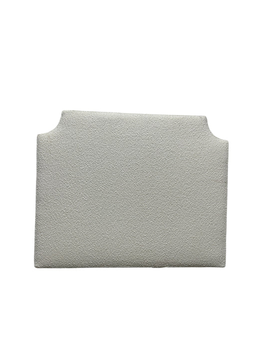 Dormify white twin headboard with bouclé fabric and a charging outlet.