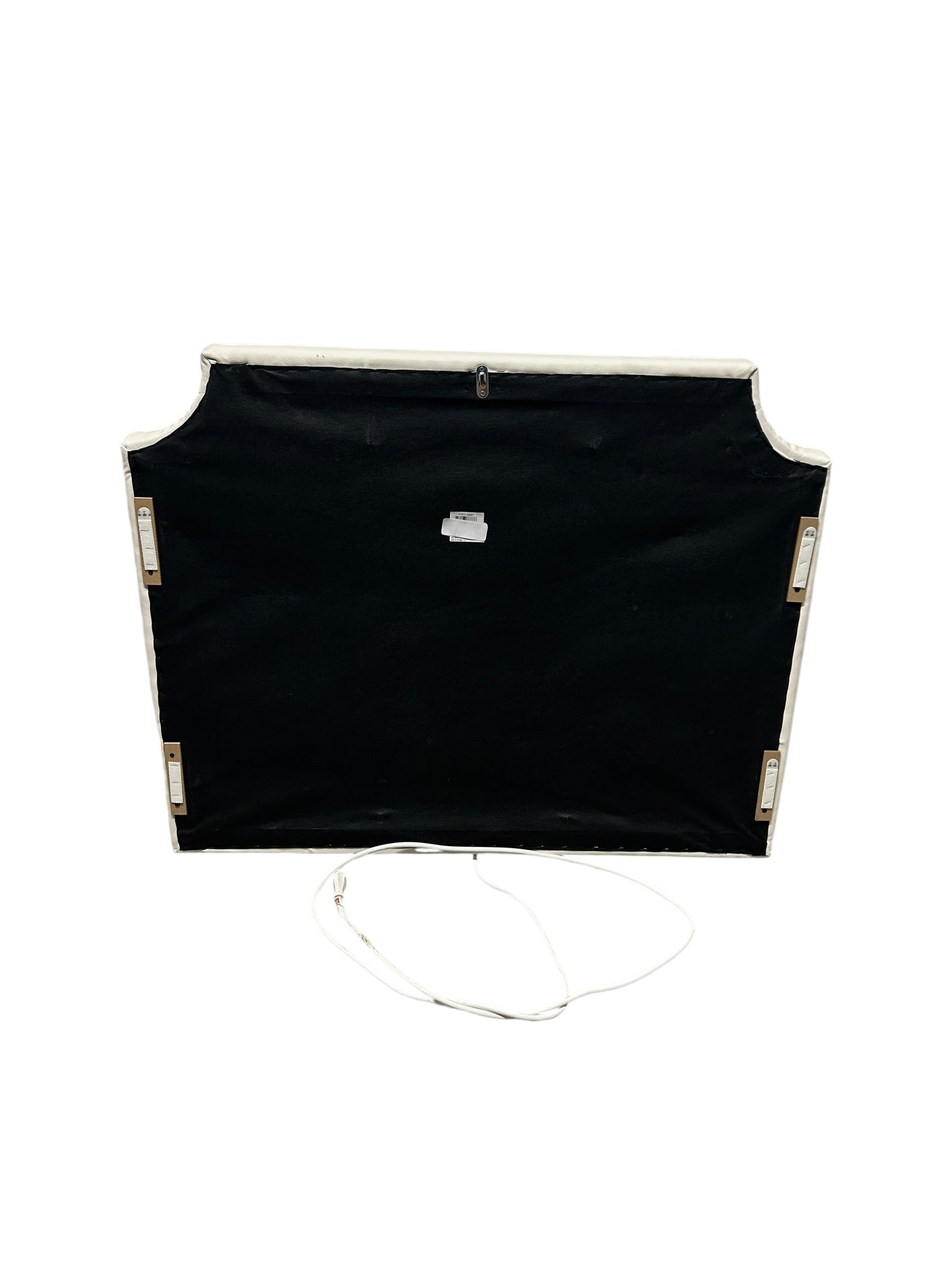 White twin headboard with silver buttons and a charging outlet.