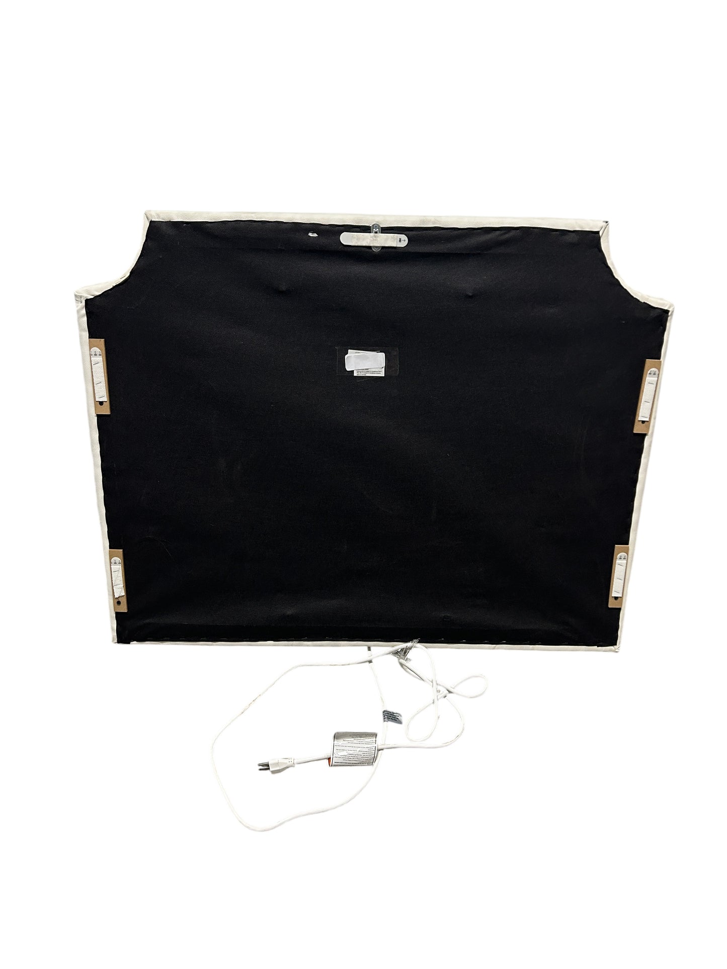 White twin headboard with silver buttons and a charging outlet.
