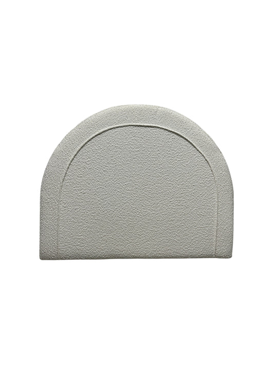 Dormify white twin headboard with bouclé fabric and a charging outlet.