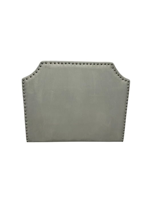 Gray velvet twin headboard with silver buttons.