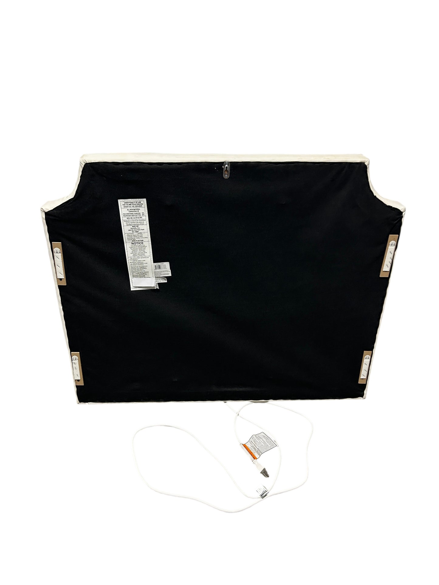 White twin headboard with silver buttons and a charging outlet.
