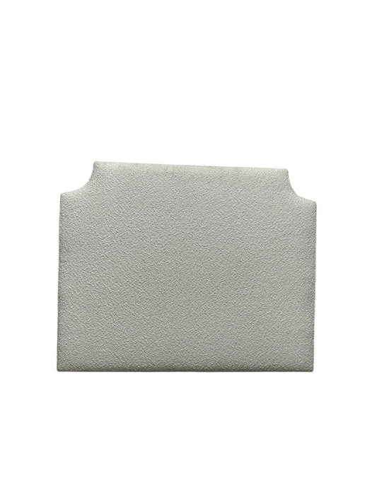 Dormify white twin headboard with bouclé fabric and a charging outlet.