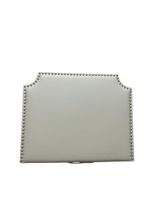 White twin headboard with silver buttons and a charging outlet.