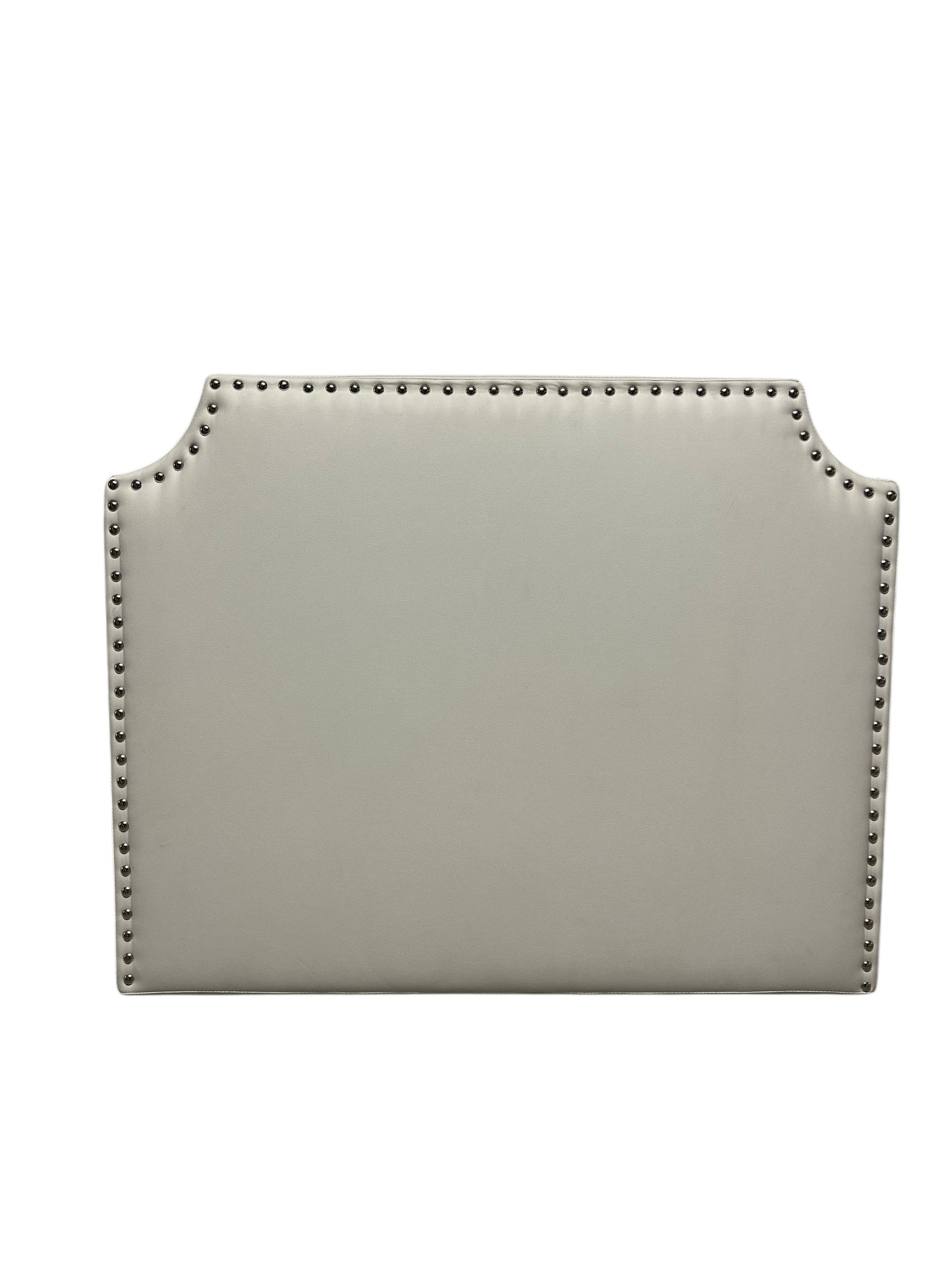 White twin headboard with silver buttons and a charging outlet.