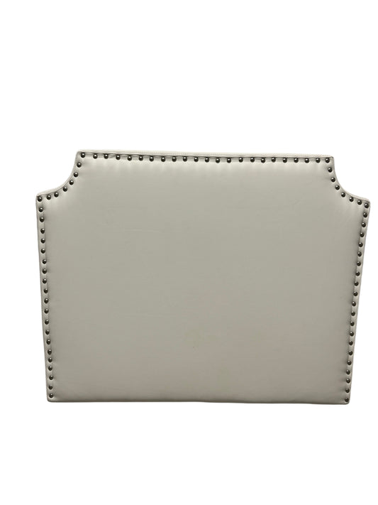 Dormify white twin headboard with silver buttons and a charging outlet.
