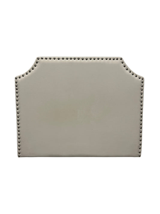 Cream velvet twin headboard with silver buttons.