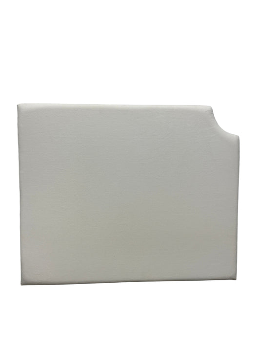 Cream velvet twin headboard with a notched corner.