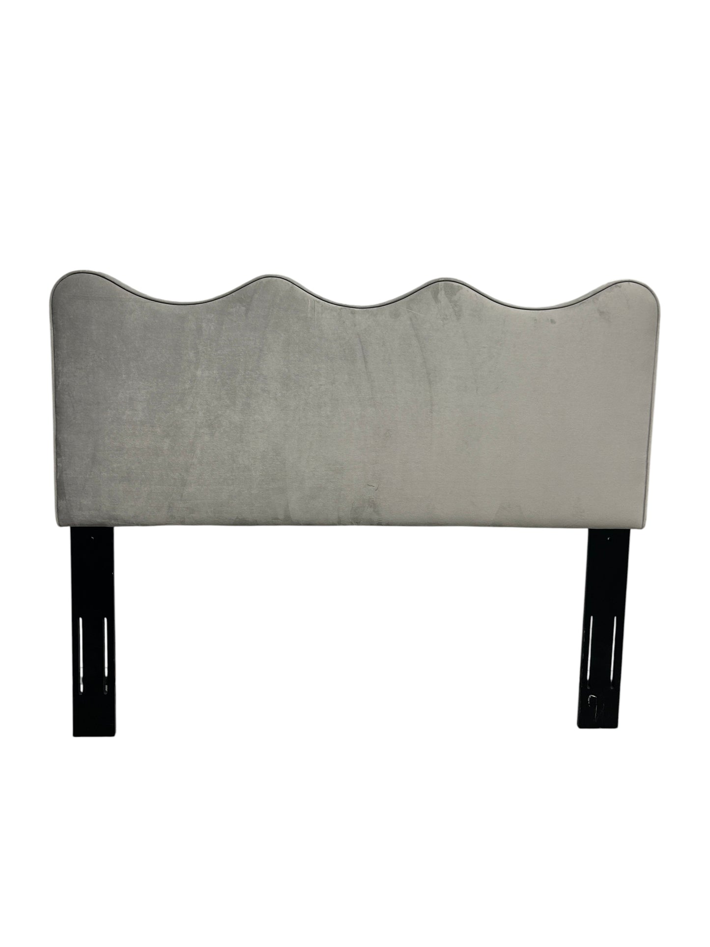 Gray queen velvet headboard with black wooden legs.