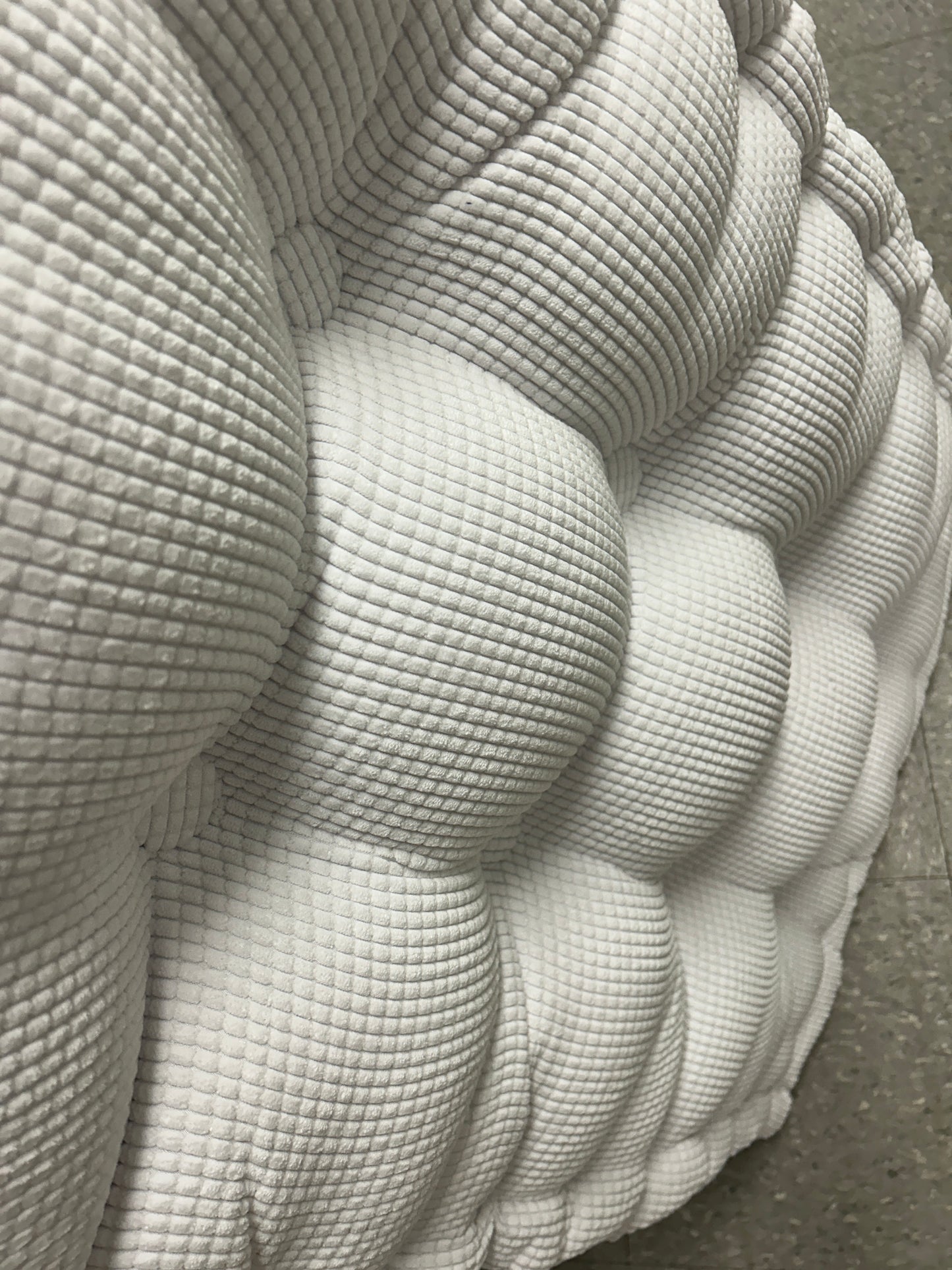 DormCo gray ultra thick ruffed college headboard.