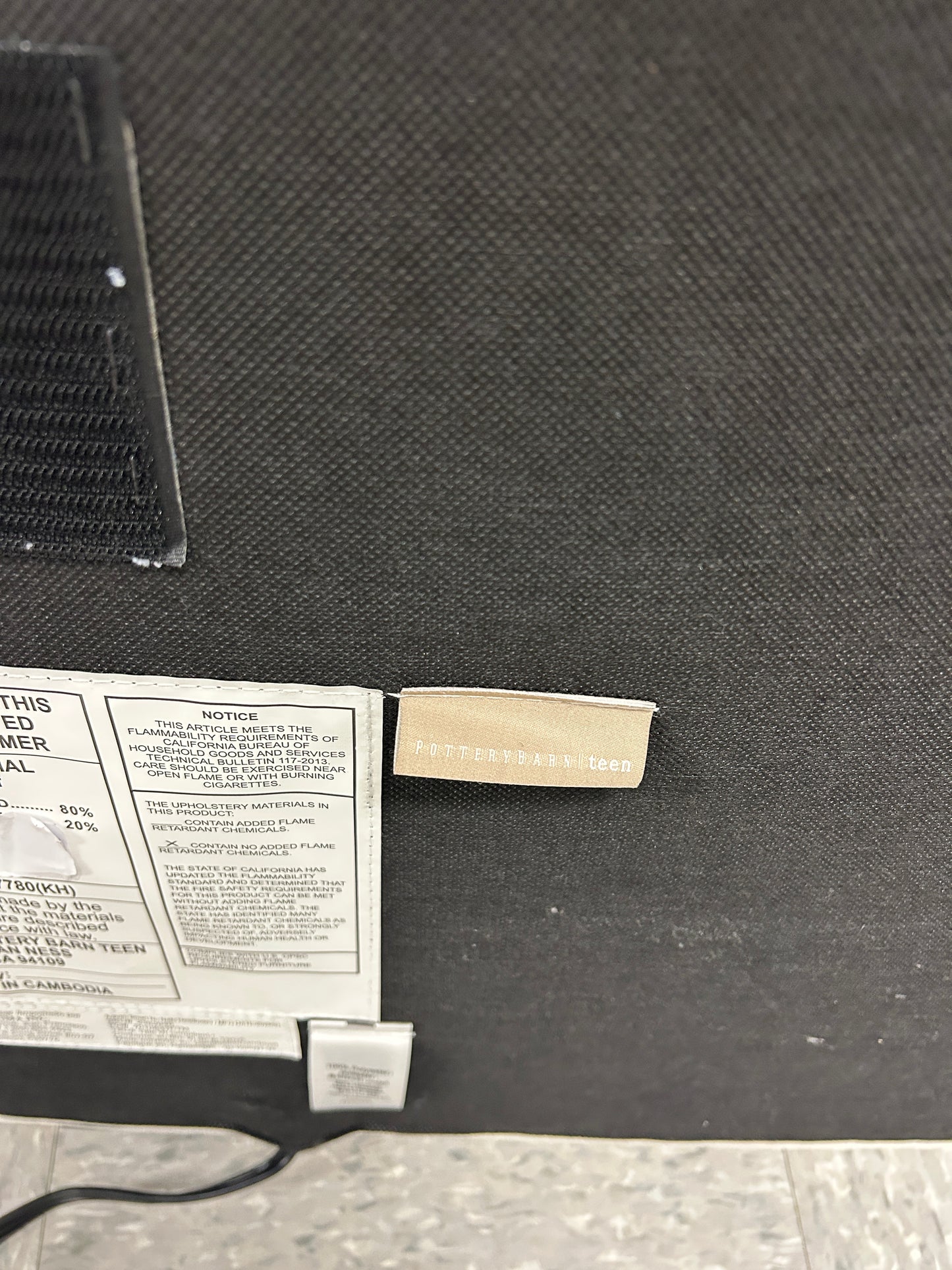 Pottery Barn Teen white twin headboard with charging port.